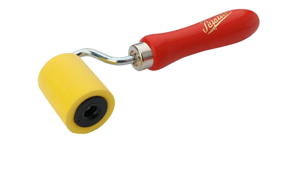A yellow paint roller with a red handle and metal neck, commonly used for printmaking or crafts, isolated on a white background.